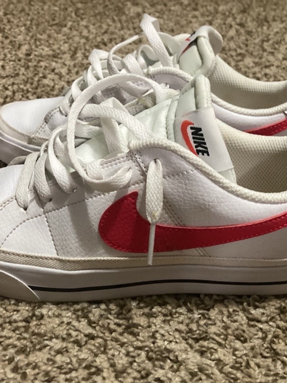 Nike Women's White Sneakers with Red Swoosh
